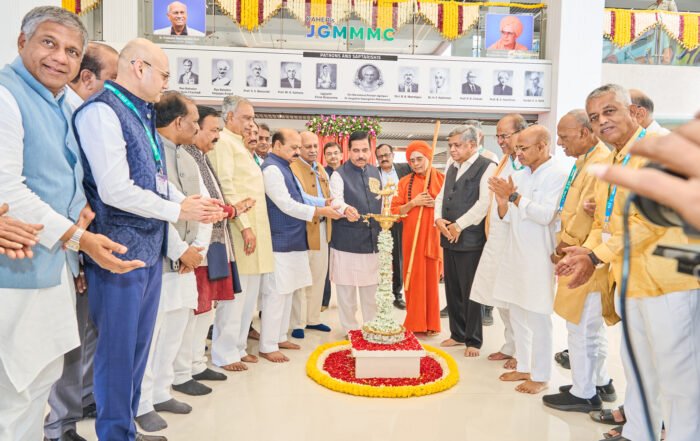 Union Minister Pralhad Joshi inaugurates KLE Moorusavirmath Medical College in Hubballi in the presence of dignitaries.